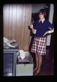 Nan Scott weighing grain sample, Oregon State University, Corvallis, Oregon, November 1977