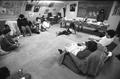 Group in Native American Longhouse