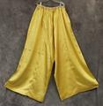 Pants of yellow satin with elasticized waistband in a cotton channel