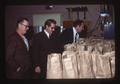 Dave Moore and others examining grain in lab, Sherman Experiment Station, Moro, Oregon, 1976