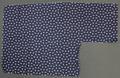 Textile Sample of dark blue woven cotton with ivory print of a pattern of three connected arrows - repeat pattern of a tiny motif