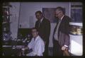 Dean Elmer Stevenson and Dr. Joseph Wales observing "Buchanan" at work in Food Toxicology and Nutrition Laboratory, Corvallis, Oregon, 1967