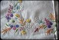 54 x 68 inch embroidered tablecloth done by Emma Groat 1946