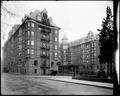 Portland Hotel from corner of 6th and Yamhill. Auto parked in foreground.