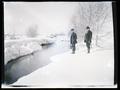 Men standing in snow