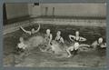 Women swimming in pool, probably playing water polo, 1938