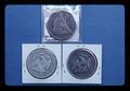 Three 1870 United States dollar coins, 1981