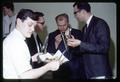 David Elle serving fish sausage at Seafoods Laboratory dedication, Oregon State University, Astoria, Oregon, circa 1965