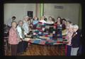 RSVP women with quilt, Oregon, 1975