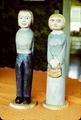 Immigrant couple, 15 in and 16 in tall. Pine. Acrylic.