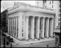 US National Bank building, at 3rd and Oak, Portland. Tower and sign for Union Hotel visible above bank.