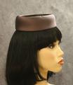 Pillbox-hat of dark eggplant taffeta with open crown