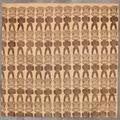 Textile Panel of cocoa tan cotton with brown block print of rows of identical Tiki God figures