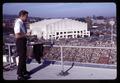 Dennis Hedges on President's box roof, Parker Stadium, Oregon State University, Corvallis, Oregon, circa 1969