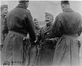 General Ulysses McAlexander with his Distinguished Service Cross being congratulated