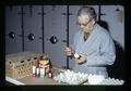 Jesse Parker injecting food coloring in egg, Oregon State University, Corvallis, Oregon, circa 1972