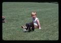 Child and spider monkey in park, Bend, Oregon, 1974