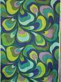 Textile yardage of bright green, olive, shades of turquoise, and purple linen in a screen printed psychedelic design