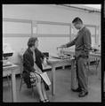 Visitors looking at lab equipment in Weniger Hall, Fall 1962