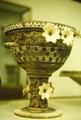 Krater with flowers in relief