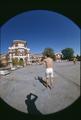 Fisheye view of a frisbee toss near Weatherford Hall