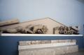 Heracles and 3-headed tufa monster, pediment