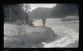 Group standing on the edge of a river