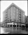 Royal Building, Broadway and Morrison, Portland. Shoe store and piano company at ground level. Delivery wagon on street in foreground.