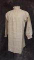 Man's nightshirt of ivory linen with ring collar and button placket opening at front