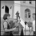 Ballot measure #1 marathon participants holding a lit torch in front of the Benton County Courthouse