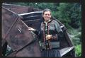 Inga by the waterwheel--wearing traditional Norwegian sweater, knit for her in Norway