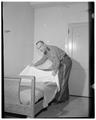 A State Police School sargeant makes a bed; Summer Session