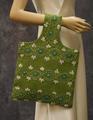 Tote-like handbag of green woven burlap with blue, turquoise and white yarn embroidery