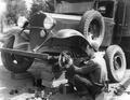Repairing truck brakes at Hemlock R. S. Camp, Columbia National Forest, Washington