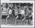OSU women’s cross country team running in Avery Park