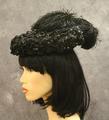 Hat of black ruffles of horsehair trimmed with black sequins