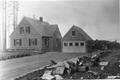 Ranger's house and garage-dirt road. See also 96-42; 02-134