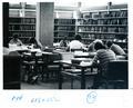 Students studying inside of the Law Library.