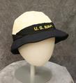 Women's U.S. Navy uniform hat with a navy brim and white cap