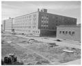 New men's dorm and cafeteria in final stages of completion, August 1957