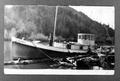 Boat Coast with man on deck