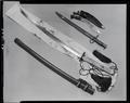 Knife (Khukri) in Leather Case [with unidentified sword, sheath and bayonet]