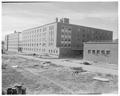 New men's dorm and cafeteria in final stages of completion, August 1957