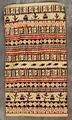 Textile panel of parchment colored cotton with horizontal bands of geometric designs, fish designs, and figured bands