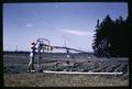 Dr. Bullock with sprinkler on strawberries, North Willamette Experiment Station, Aurora, Oregon, July 9, 1968