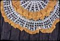 29 inch wide crocheted orange and white doily unfinished