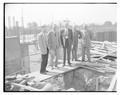 Members of the alumni board view construction work on the new OSC Coliseum