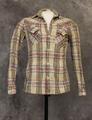 Shirt of beige crinkled cotton with red, blue, yellow, green, and black woven plaid pattern