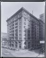 Electric building at corner of Alder and Broadway, Portland. Autos parked in street.