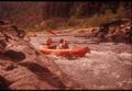 Inflated raft in white water